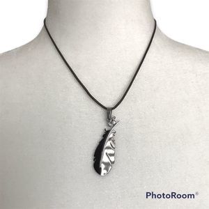 Gunmetal Black Feather Pendant with 3 Solitaire Stones On Leather Cord